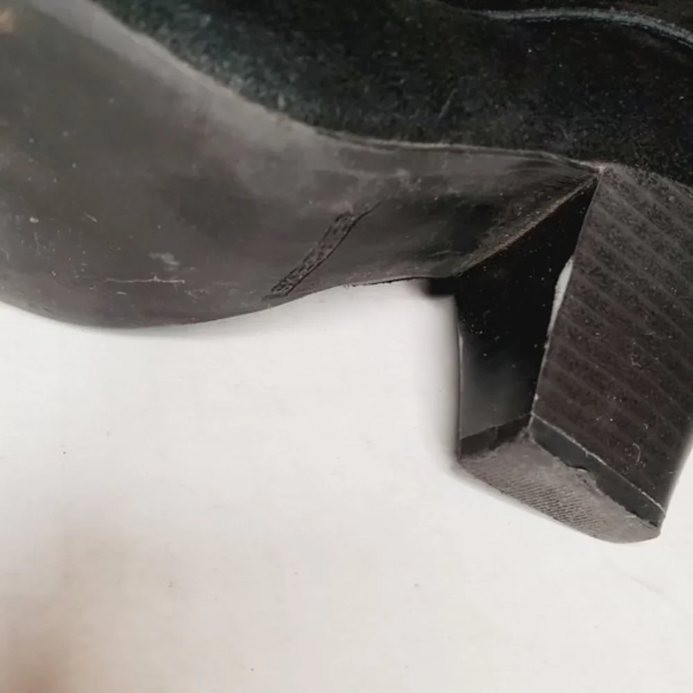 Sketcher's black suede leather fold over ankle boots